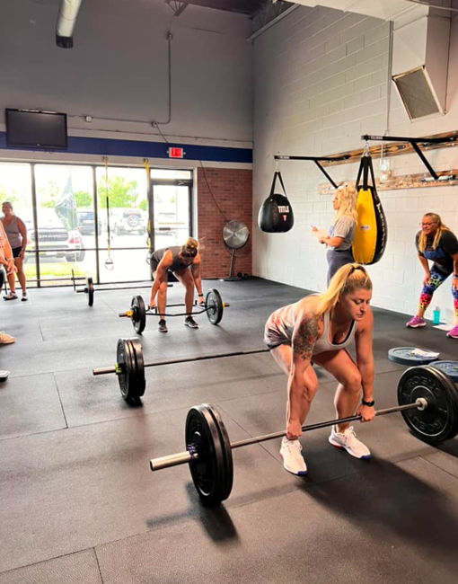 Group fitness deadlift workout at Freedom Fitness Wentzville